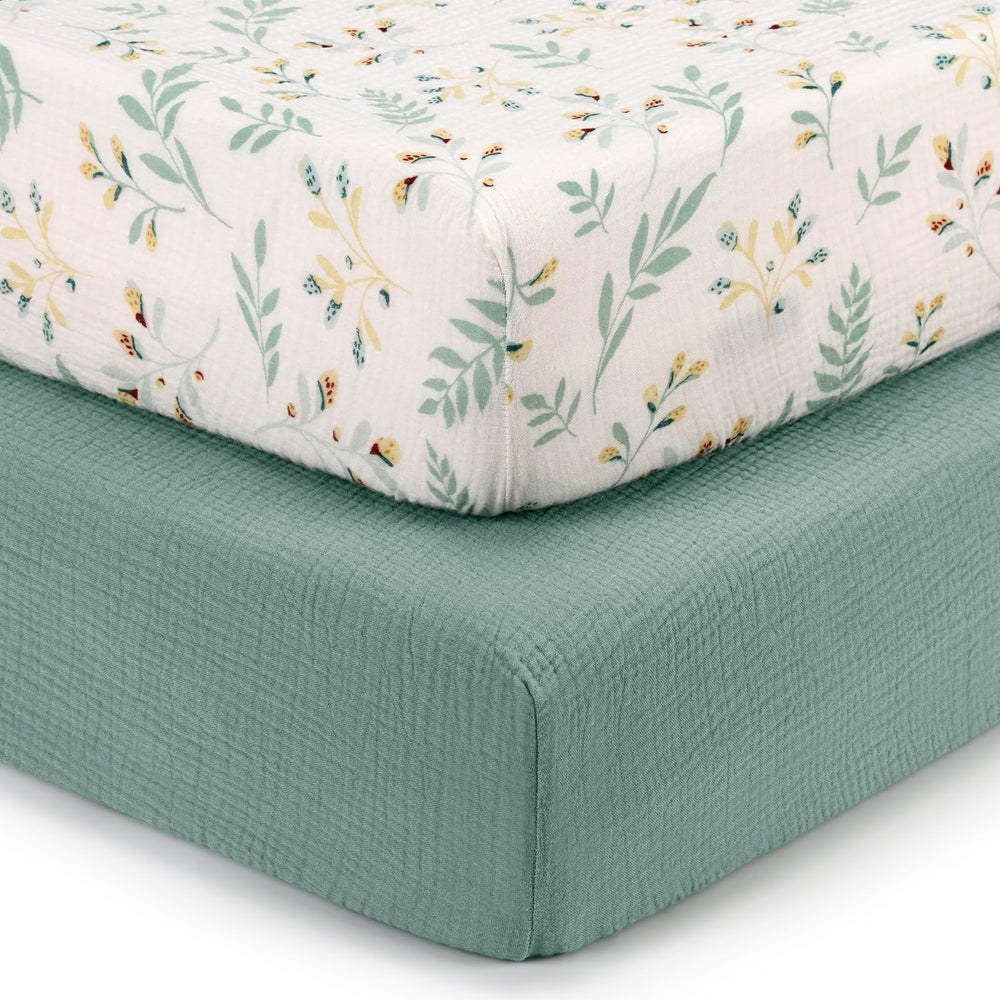 Blissful Diary muslin crib sheet in Roman Green offers soft, breathable comfort for naps