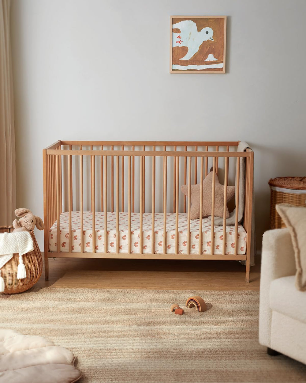 Snug-fit elastic edge on Blissful Diary crib sheet secures sheet during play
