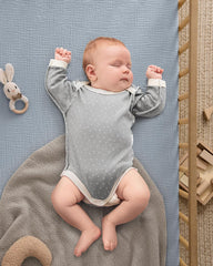 Blissful Diary 52x28 crib sheets shown fitting standard crib mattress.