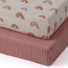 Blissful Diary muslin mini crib sheets in dusty pink with soft, breathable fabric for gentle sleep.