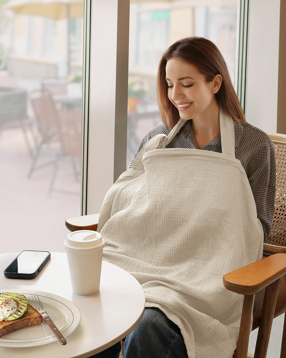 Blissful Diary cream nursing apron with adjustable straps stays secure during on-the-go feeds.