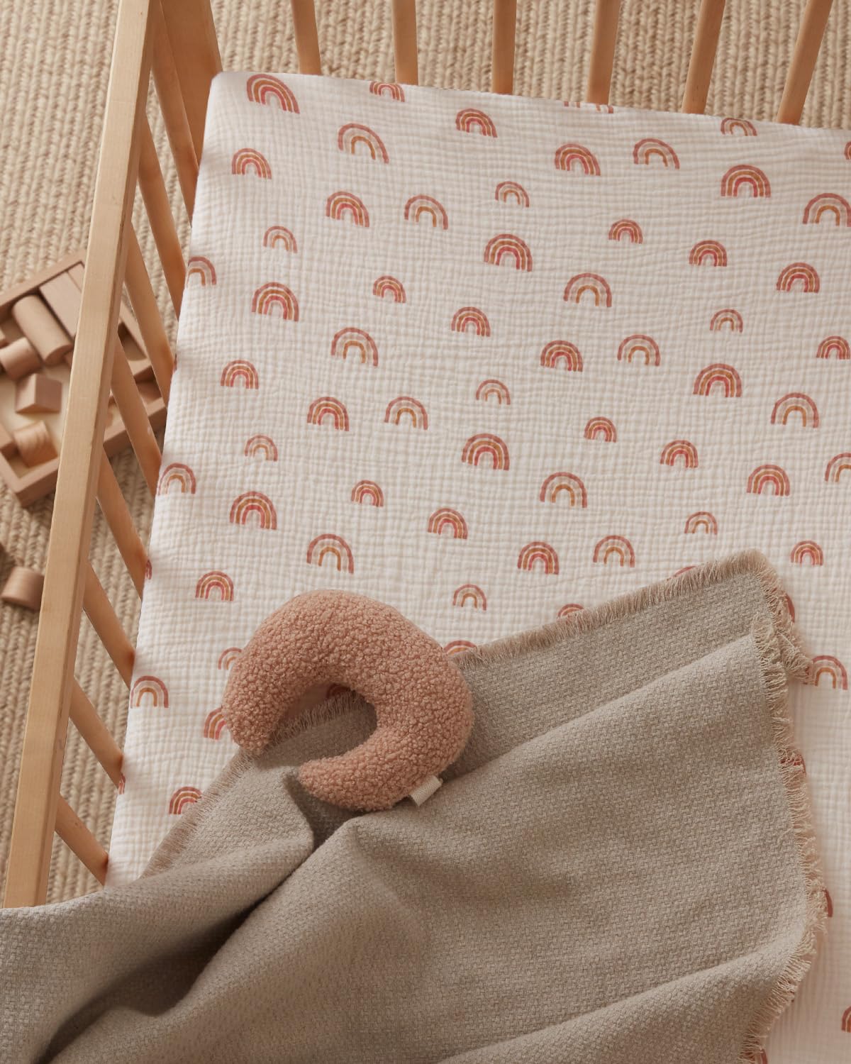 Blissful Diary pack-n-play sheets in Boho colors coordinate with nursery decor.