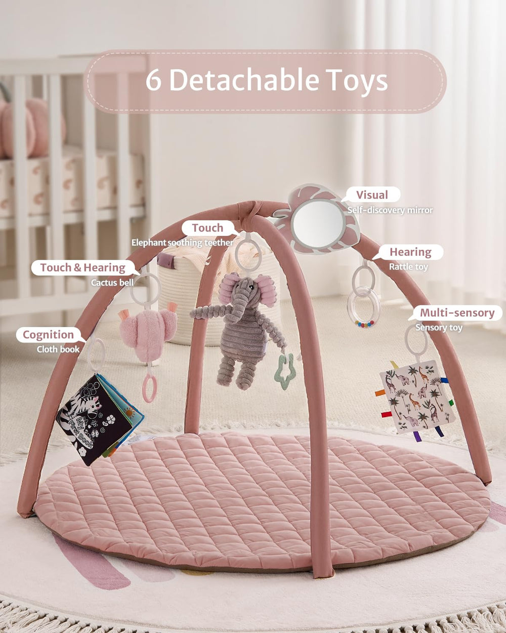 Rattle toy dangling from Blissful Diary gym arch to stimulate hearing and movement.