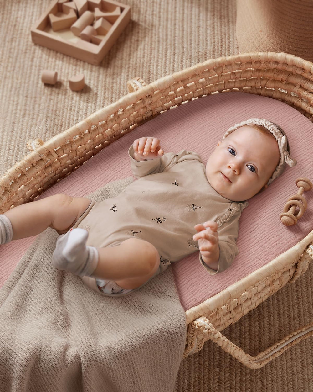 Blissful Diary snug-fit oval bassinet sheet on mattress