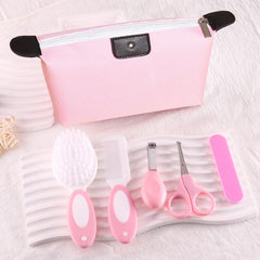 Bloomlet Baby rounded-tooth comb protects delicate hair while styling.