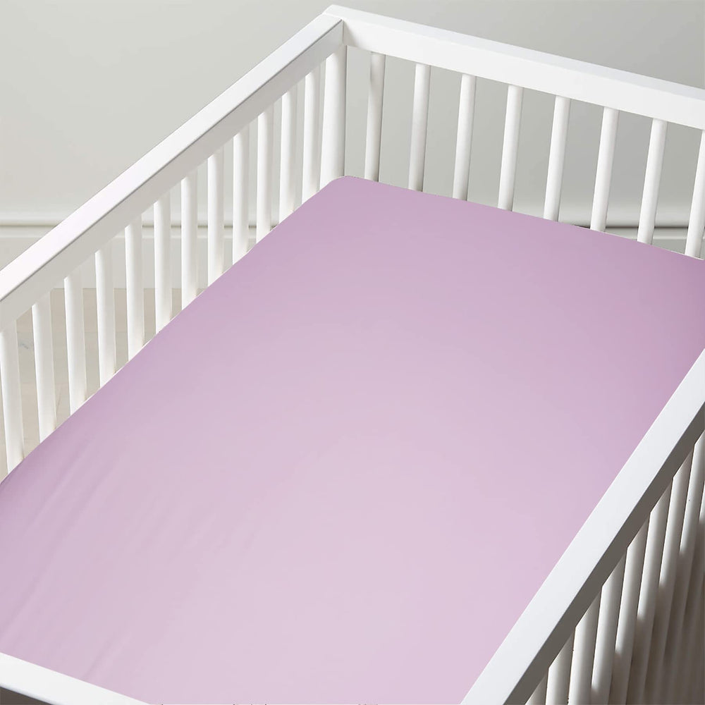 Purple BLOOMSTAR poplin sheet coordinates with nursery decor themes.