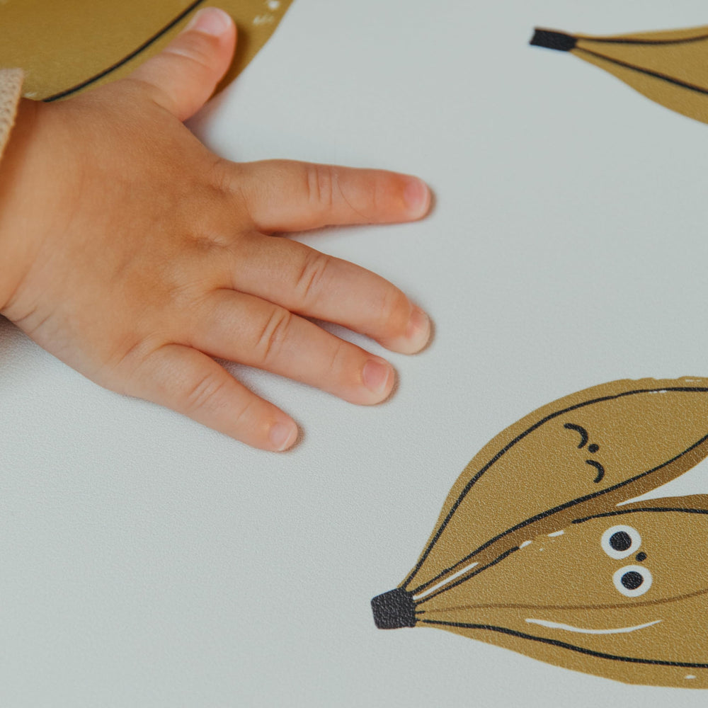 Blooom baby weaning placemat features banana design for feeding sessions.