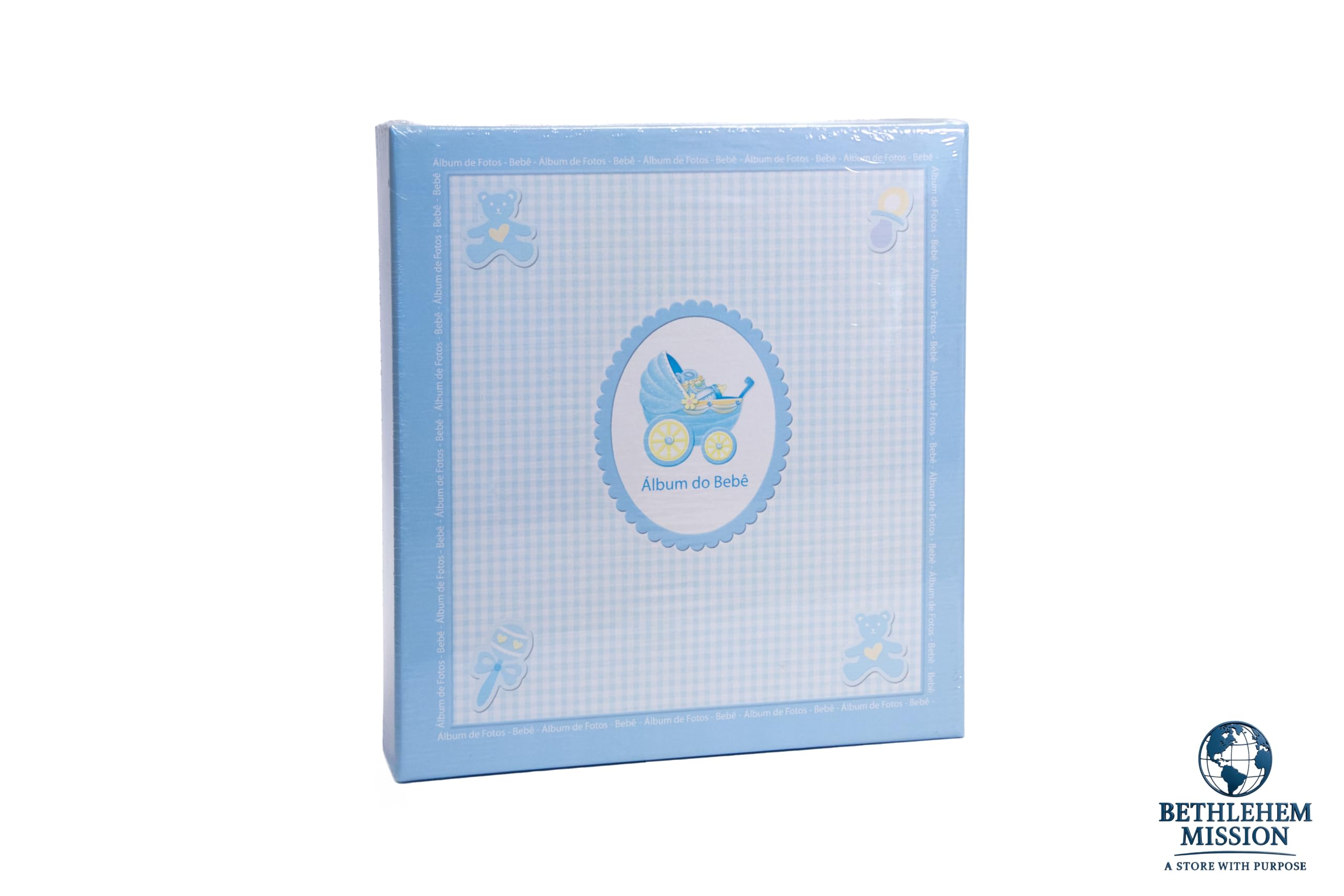 Blue baby photo album inside pages showing photo spaces for memories