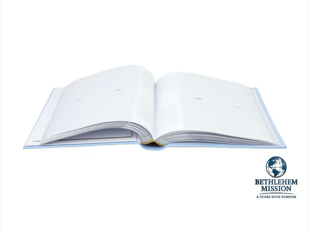 Blue baby photo album showcasing spaces and pages