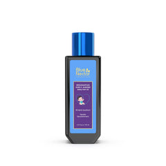 Blue Nectar baby hair oil packaging closeup with organic ingredients and safety labeling.