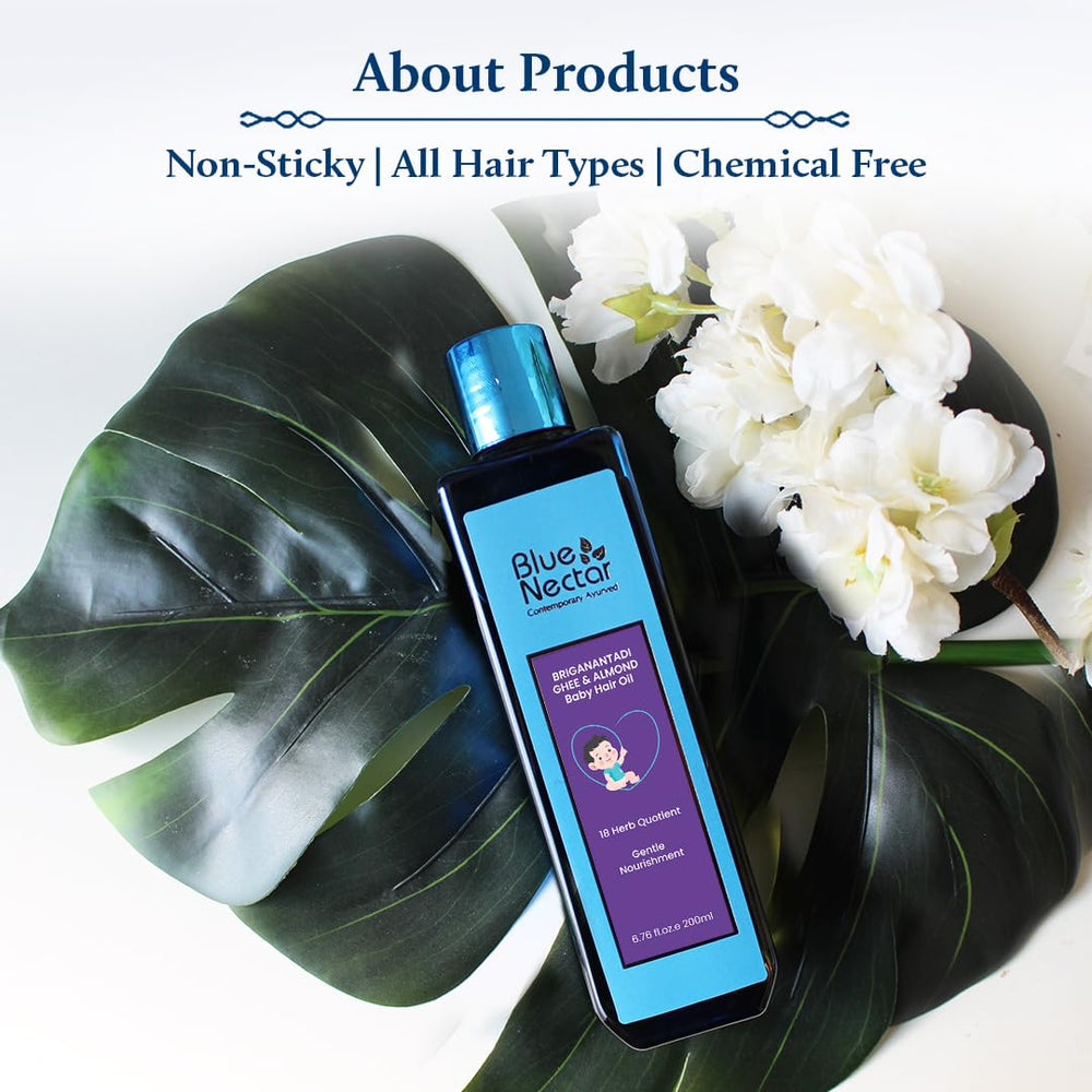 Blue Nectar oil application on newborn-friendly scalp with nourishing olive and almond oils.