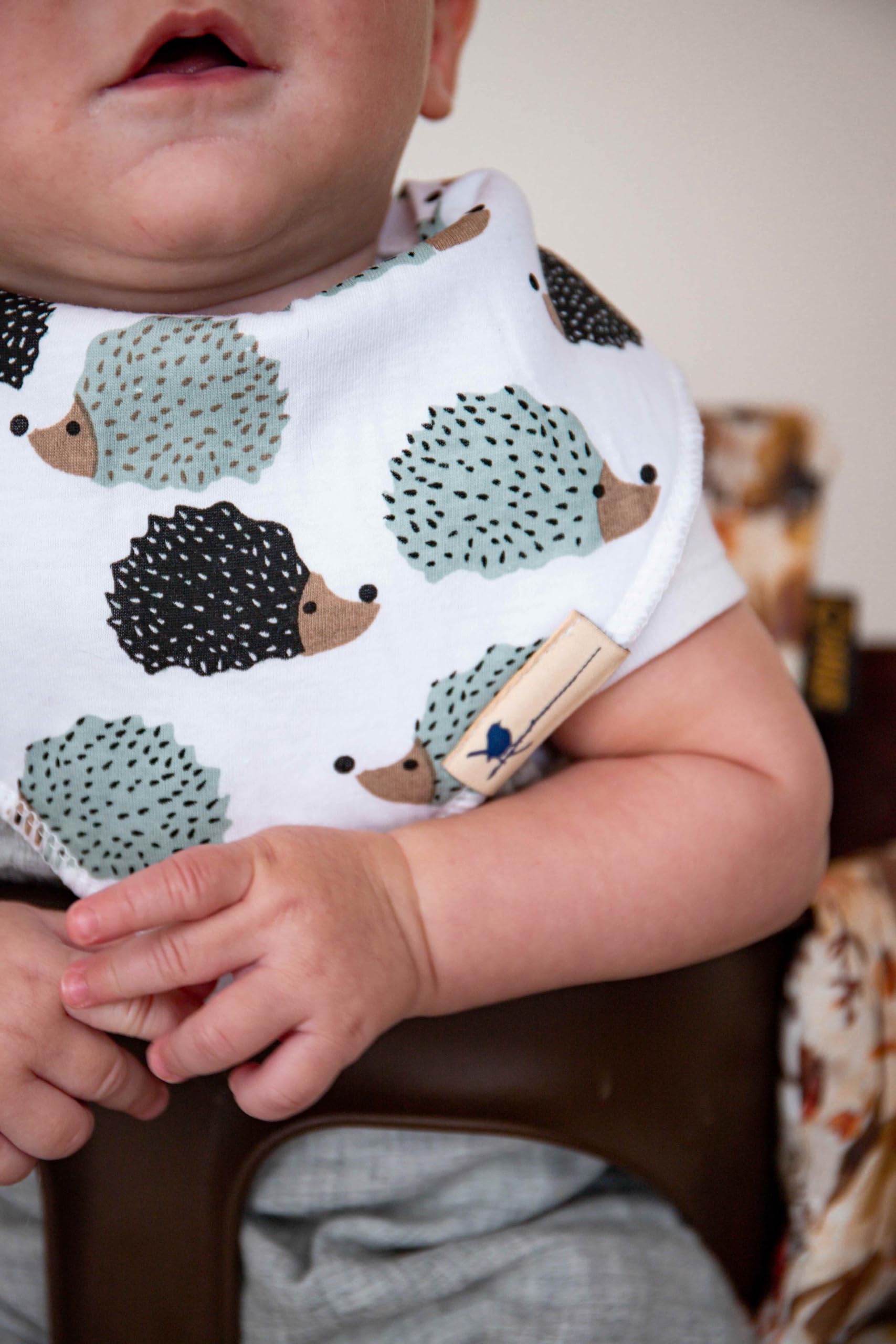 Blue Wren bib with durable stitching keeps its shape after washing.
