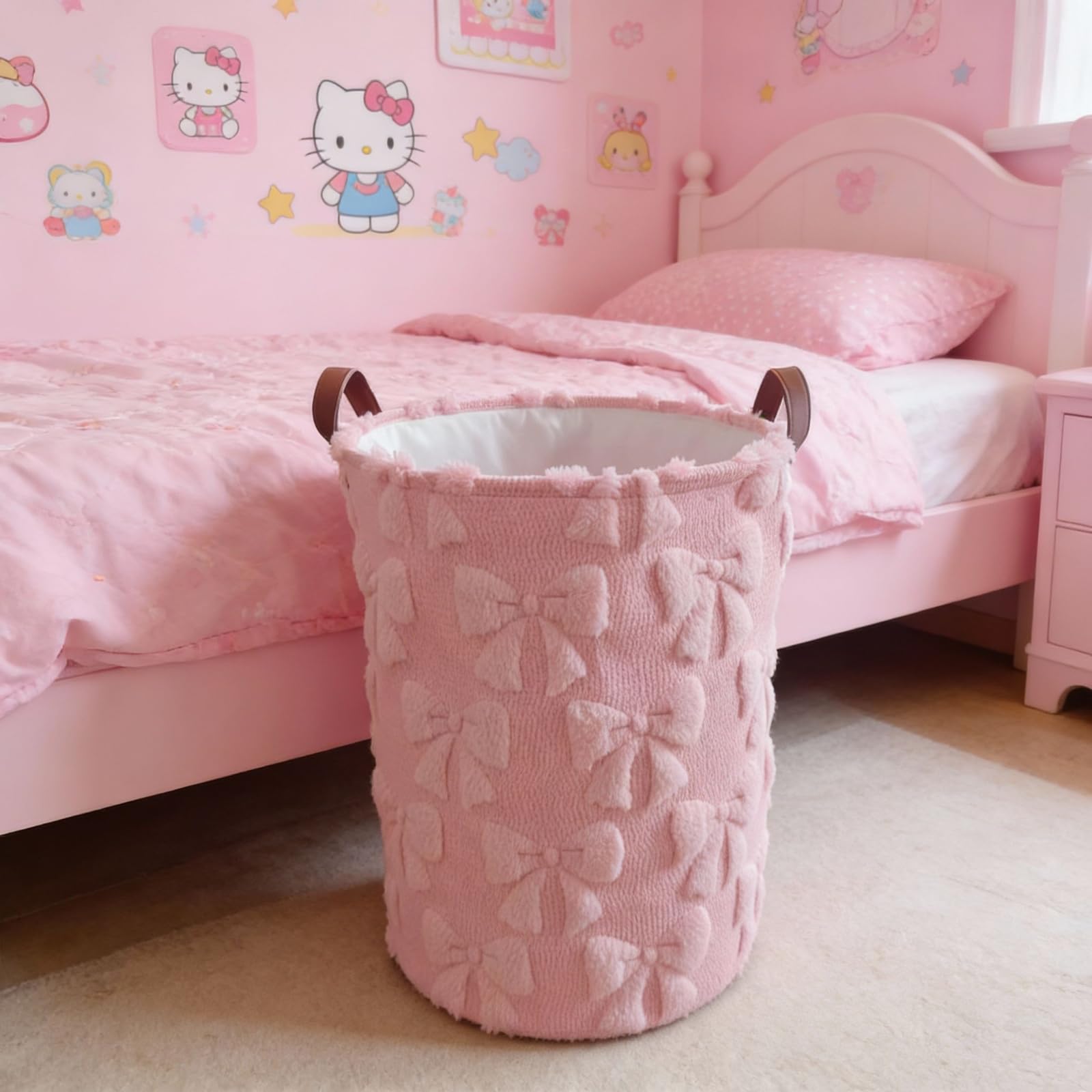 Blushtier pink bow laundry basket in a girl's room adding decorative storage
