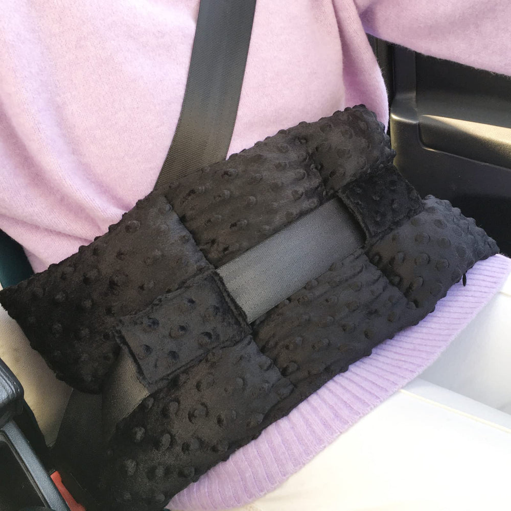 BNRendles ostomy seatbelt pillow with soft minky dot guards the stoma during car travel.