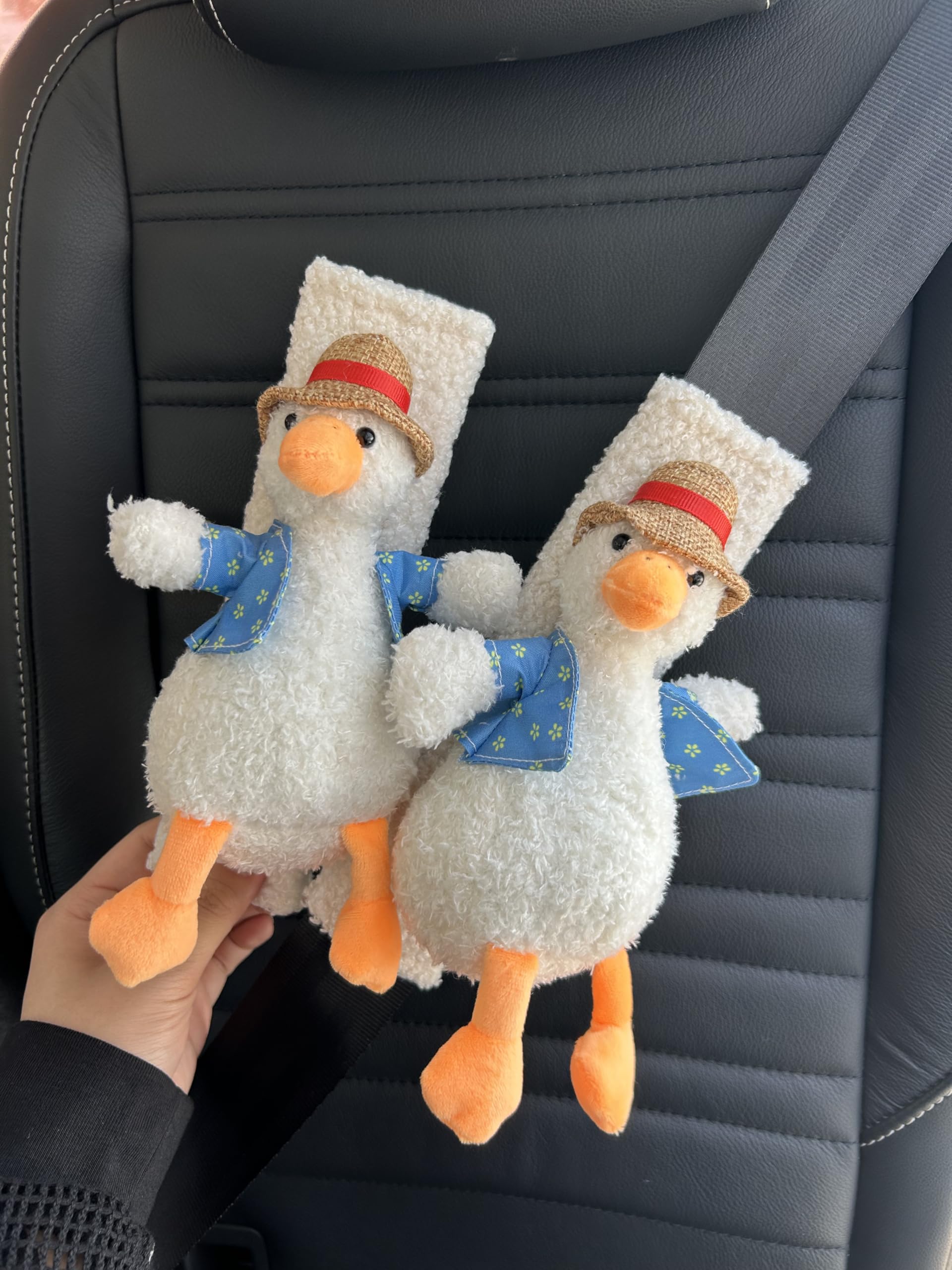 BNTR duck with hat seatbelt cover adds playful charm while protecting clothes.