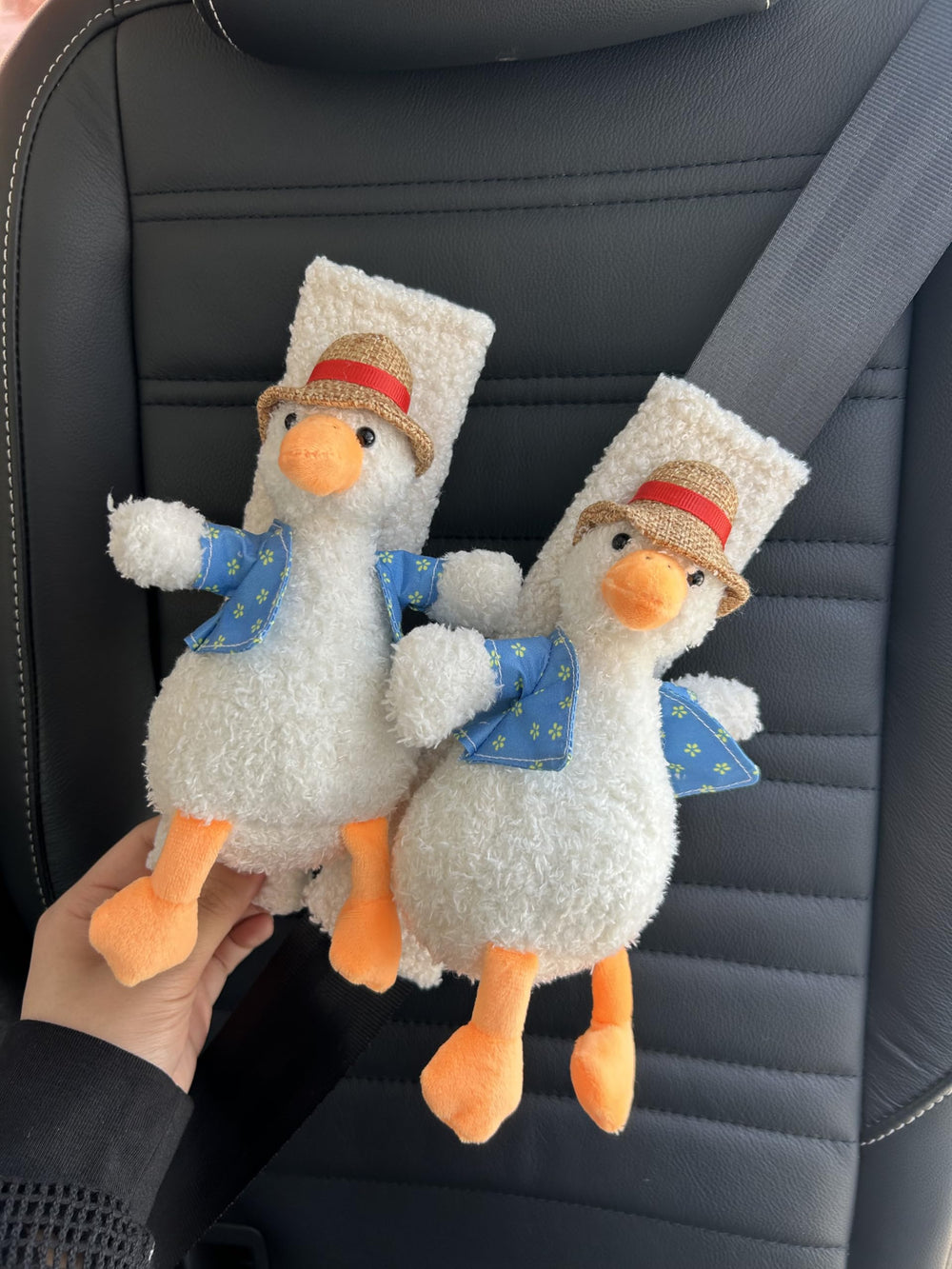 BNTR duck with hat seatbelt cover adds playful charm while protecting clothes.