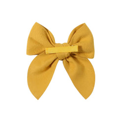 Boenbe Loved yellow satin bow clip on hair, secure grip suits fine hair.
