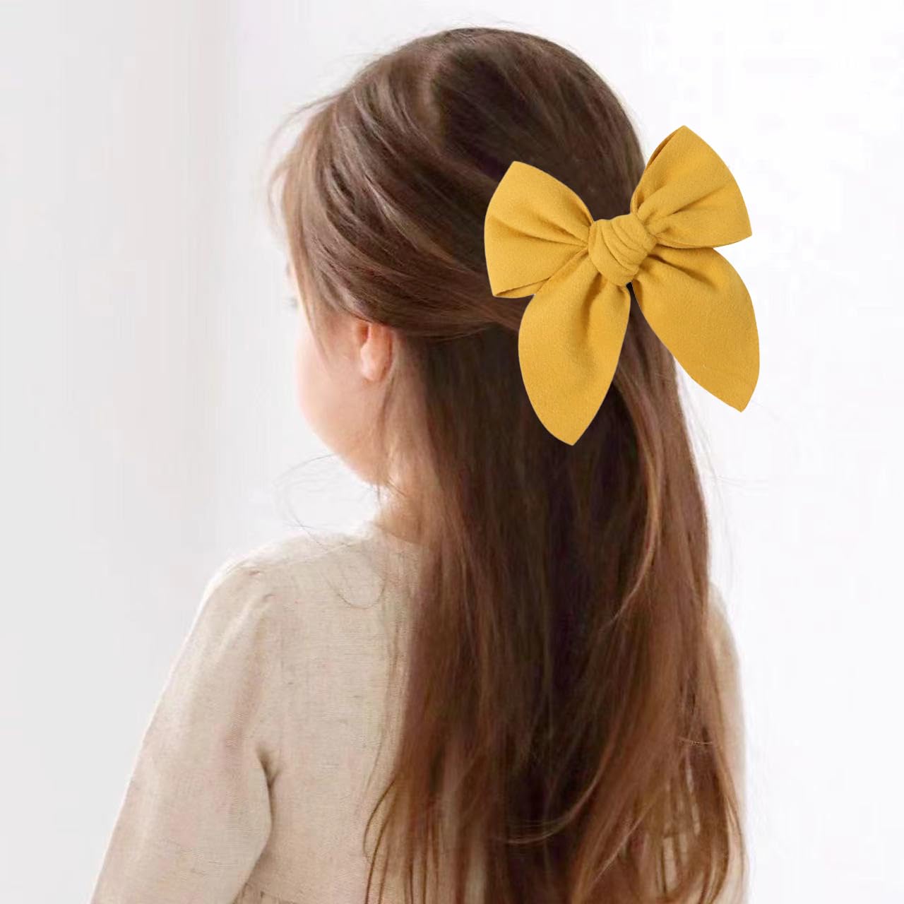 Boenbe Loved yellow satin bow clip packaging, ready for gifting.