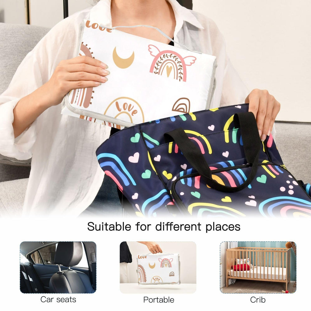 BOESI Boho Rainbow changing pad side pocket stores wipes and diapers.