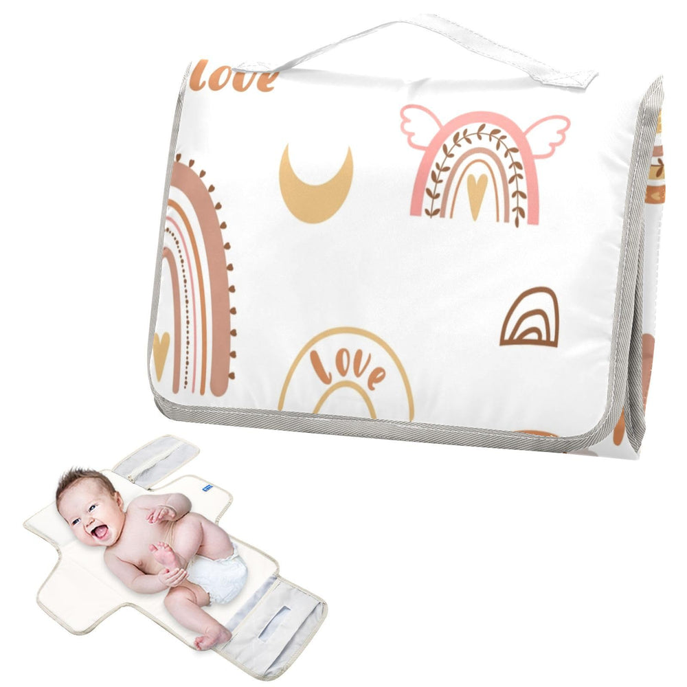 BOESI Boho Rainbow changing pad unfolded for roomy diaper changes on the go.