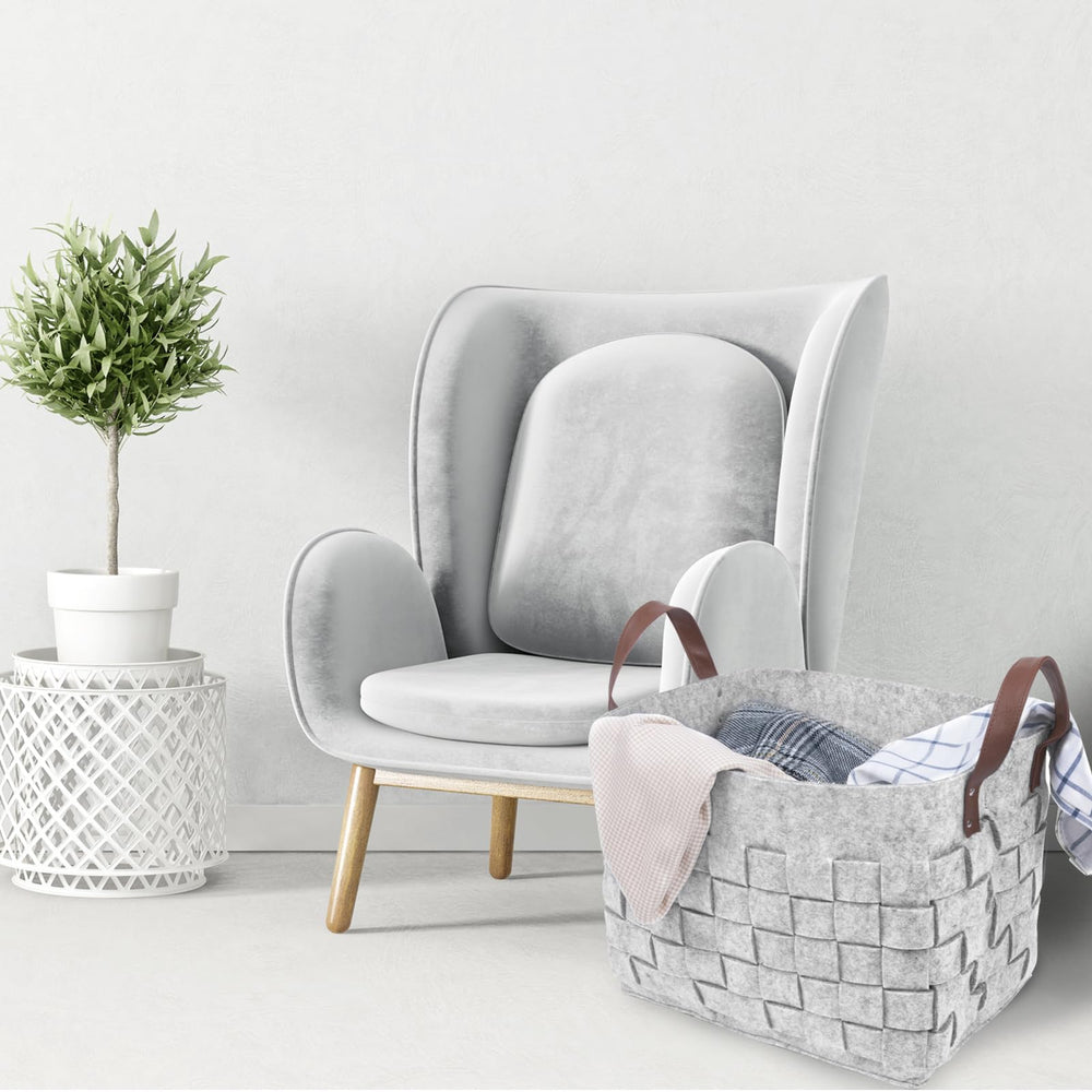 Boldmonkey blankets basket keeps living room organized and tidy.