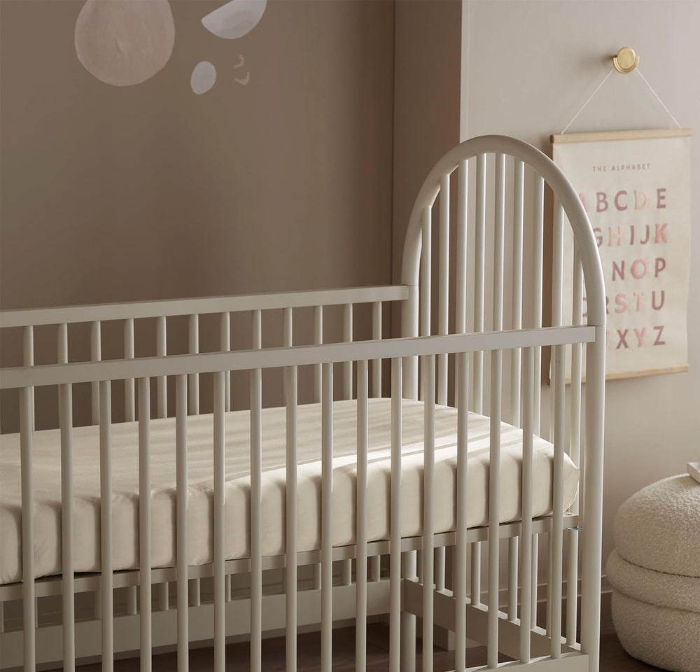 Machine washable Boll and Branch crib sheet for busy parents and easy care.