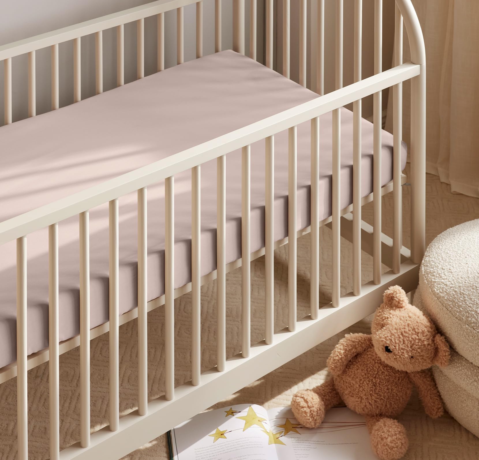 100% organic cotton Boll & Branch crib sheet offering toxin-free, gentle sleep environment for baby.