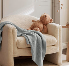 BOLL & BRANCH ribbed knit baby blanket Shore lifestyle shows cozy snuggle moments for baby.