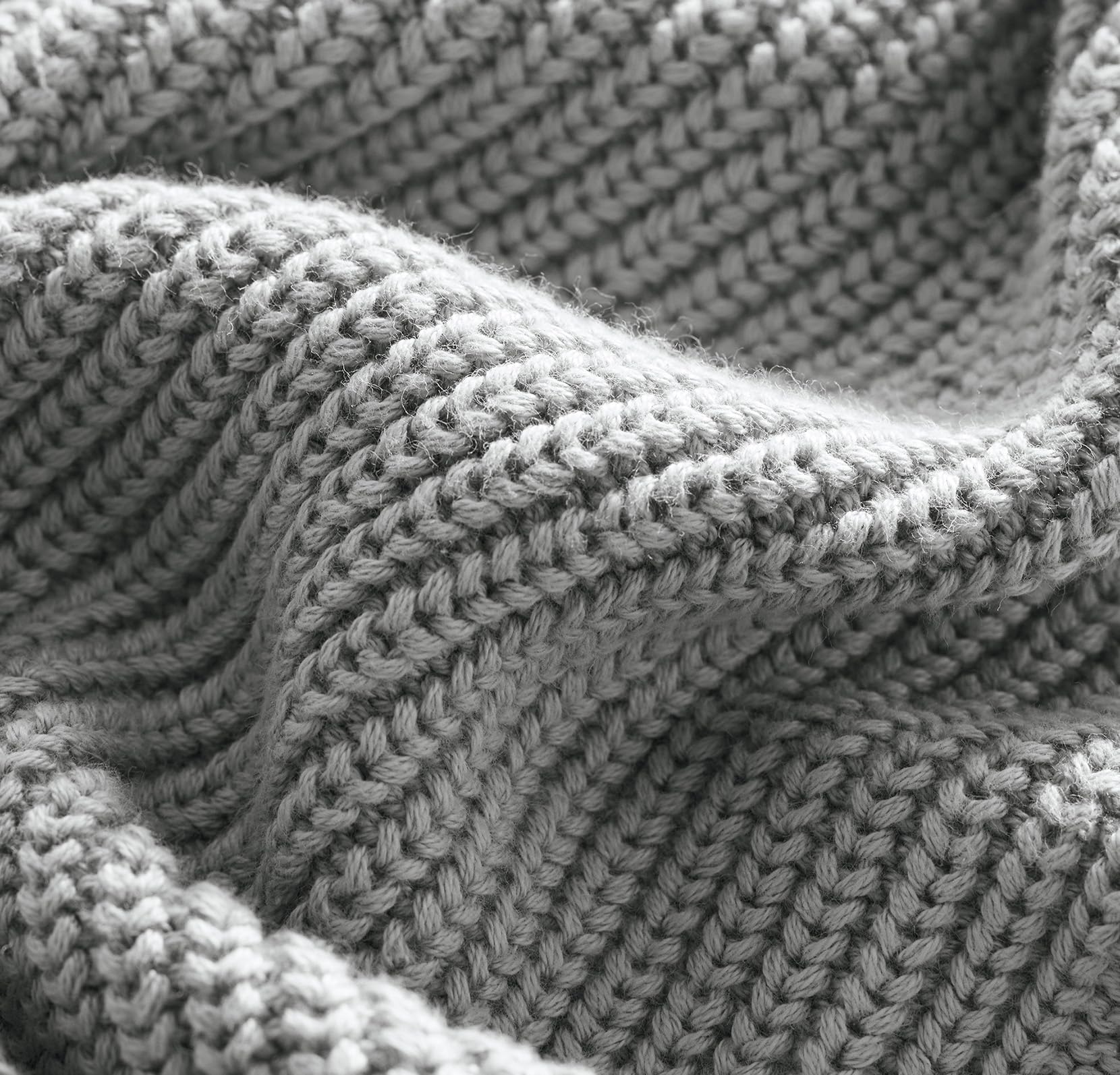 BOLL & BRANCH ribbed knit baby blanket Shore close-up reveals breathable fibers and fine texture.