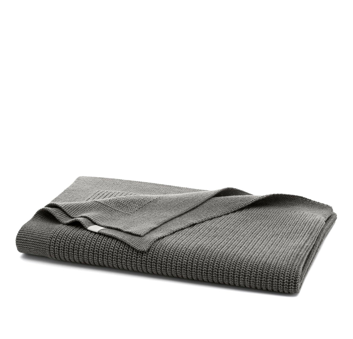 Boll & Branch ribbed knit baby blanket in stone texture provides cozy nursery warmth.