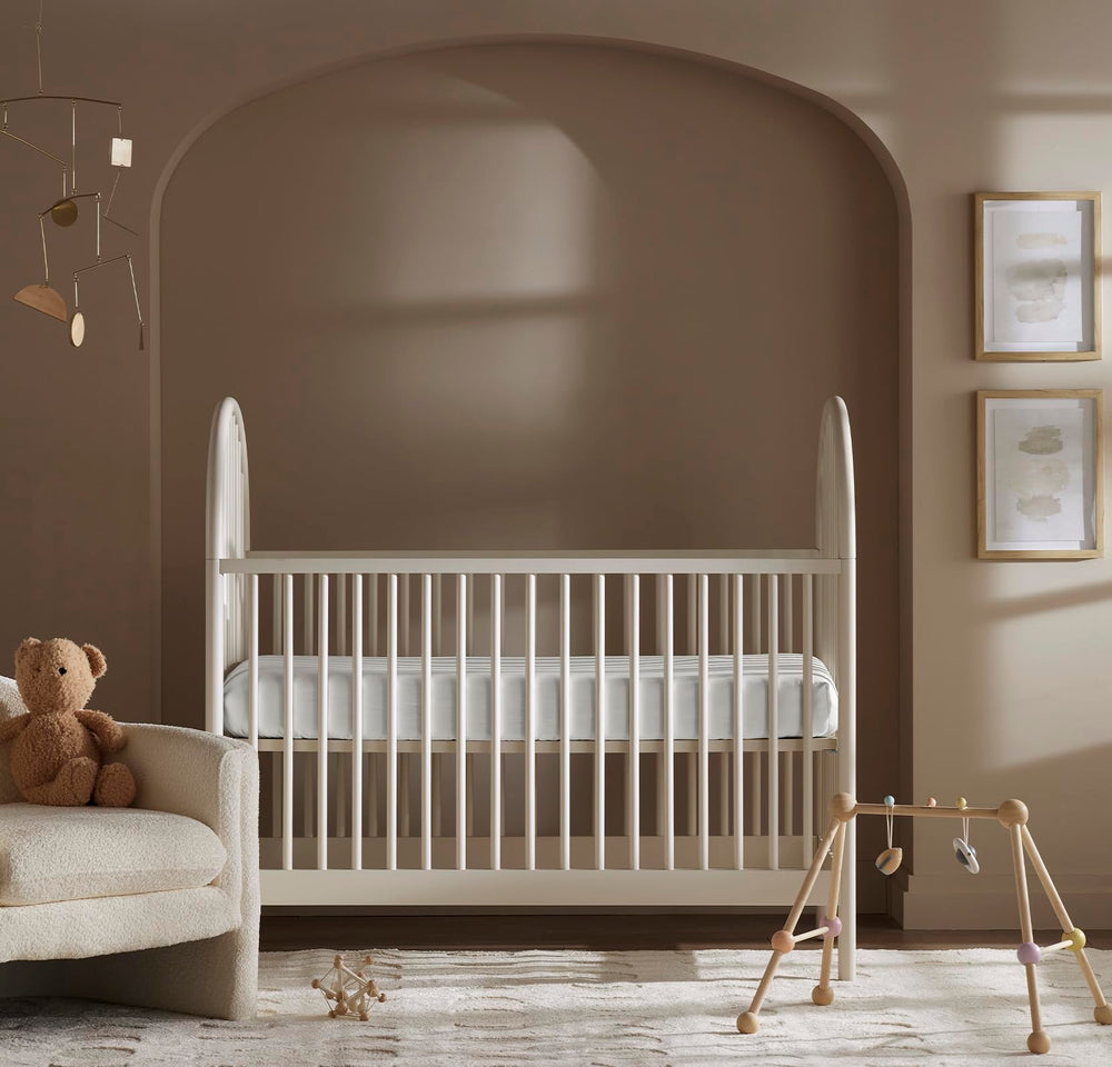 Boll & Branch Signature crib sheet elastic band close-up highlighting edge stitching