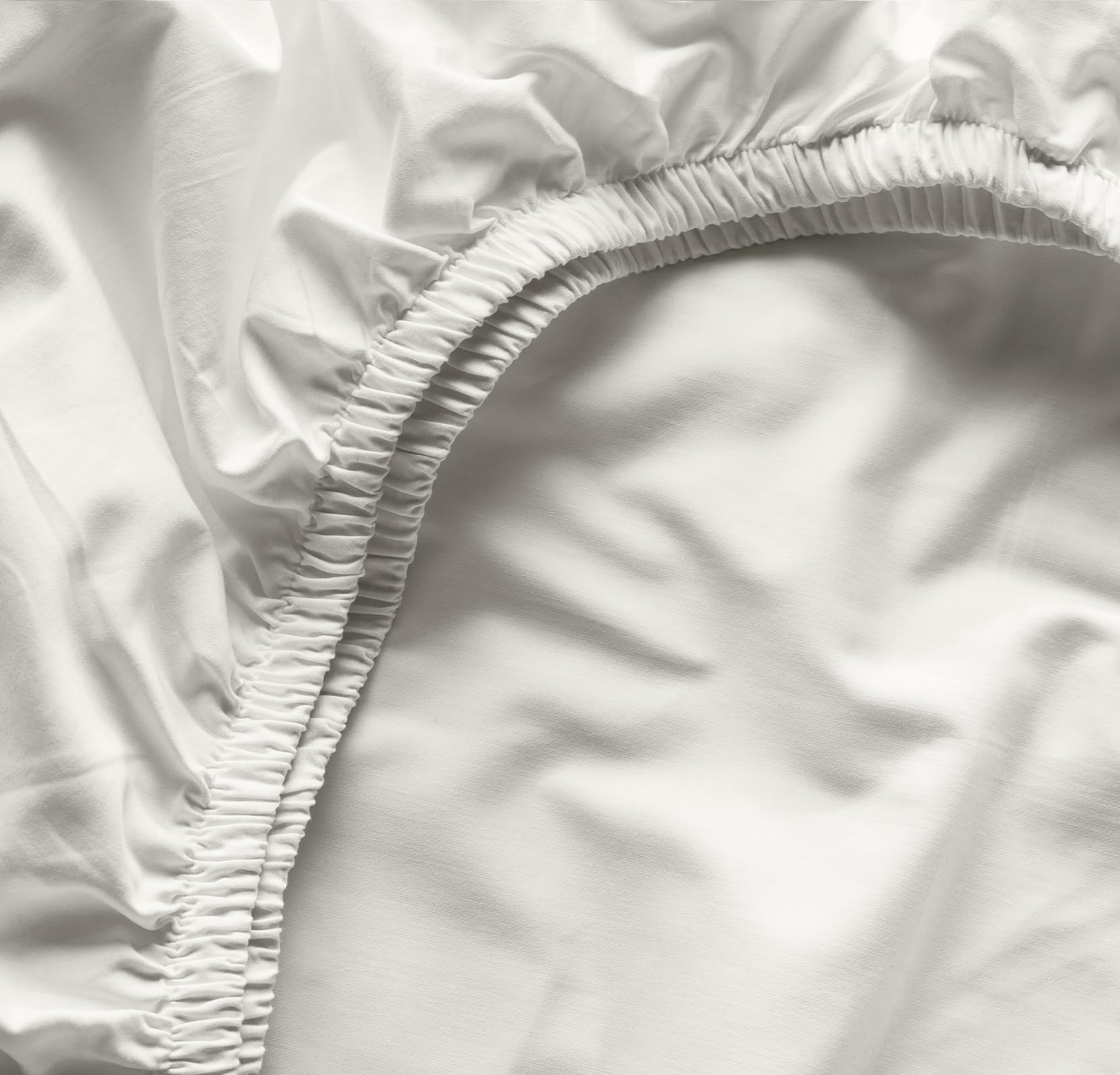 Boll and Branch soft organic cotton crib sheet for a gentle baby sleep.