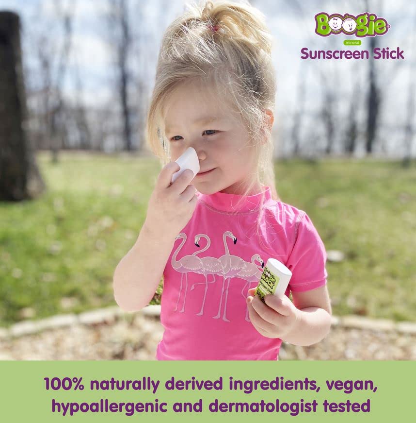 Boogie Block fragrance-free sunscreen stick applied during sunny outdoor play.