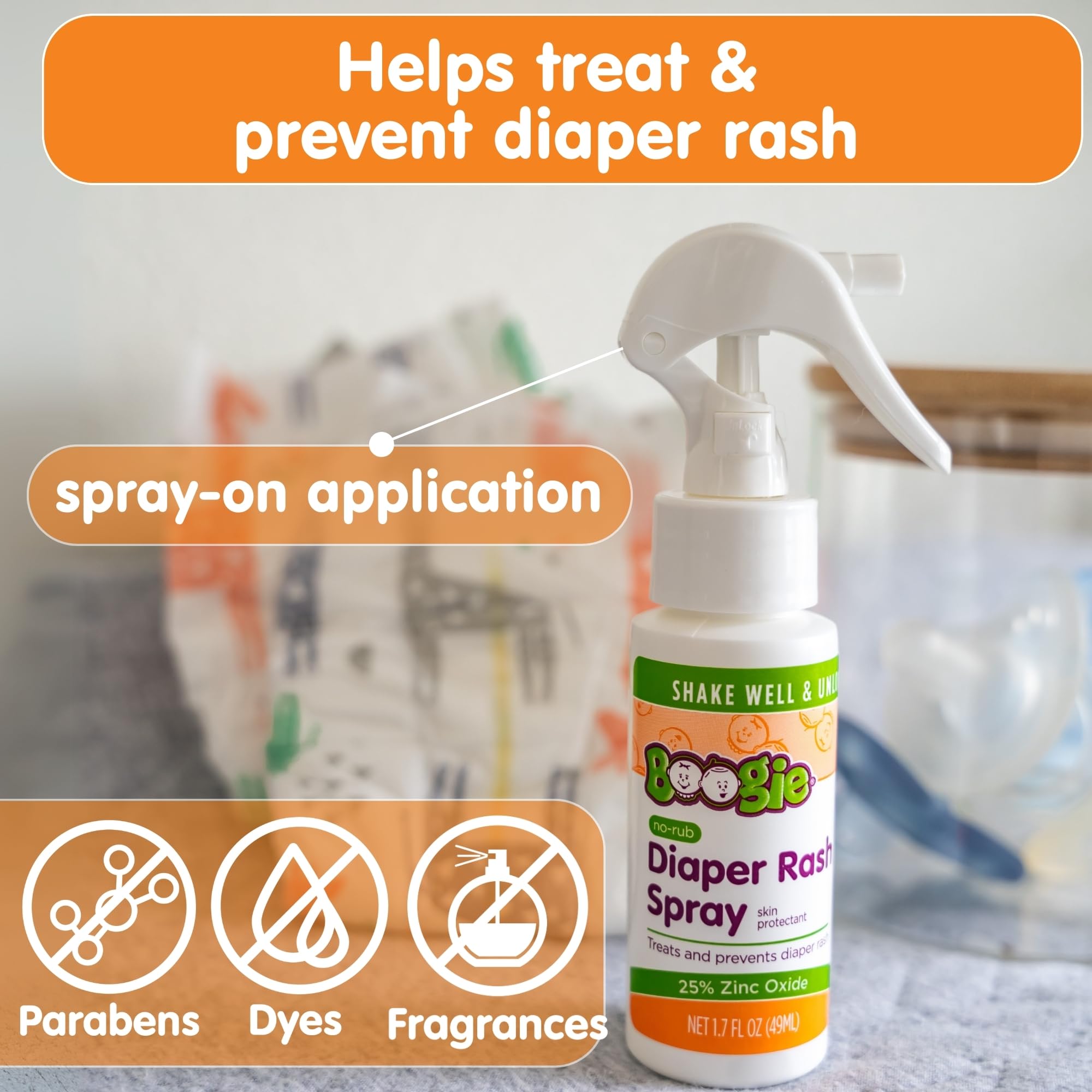 Boogie Diaper Rash Spray used during a diaper change at table.