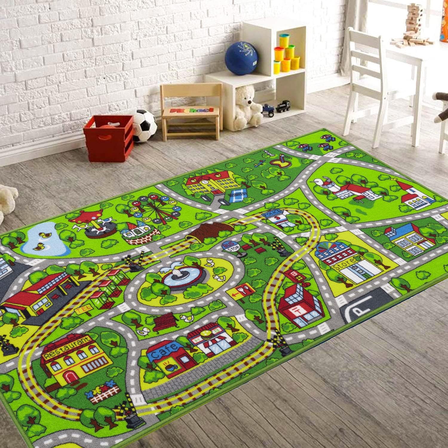 Booooom Jackson kids train and city rug full setup for imaginative play sessions.