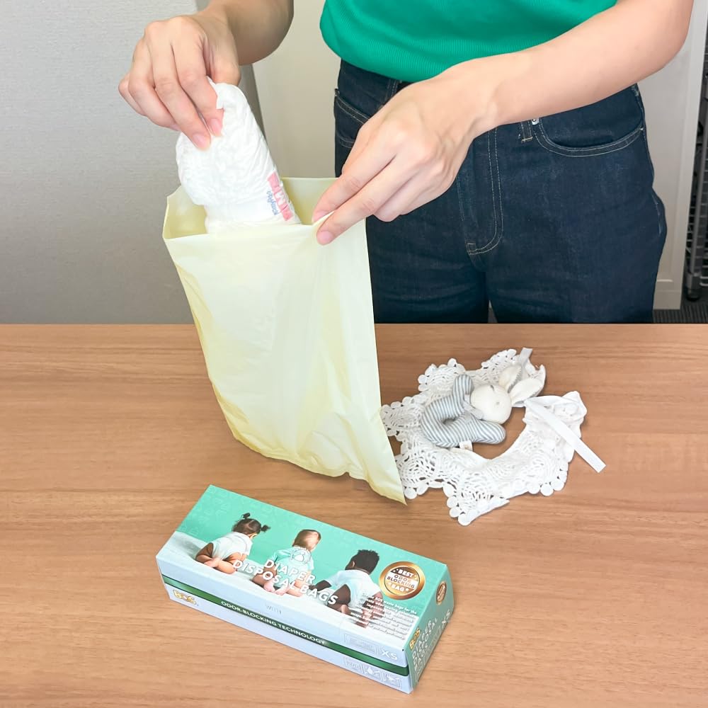 BOS diaper bags in a boxed dispenser simplify quick diaper disposal