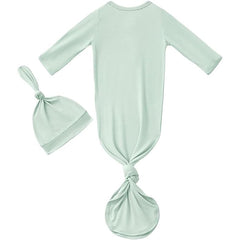 Bow Dream matching headband and bonnet in light green completing a coordinated newborn outfit.