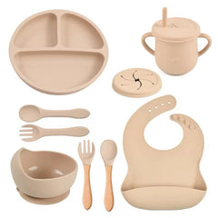 BPA-free silicone bib with deep pocket catches spills and crumbs.