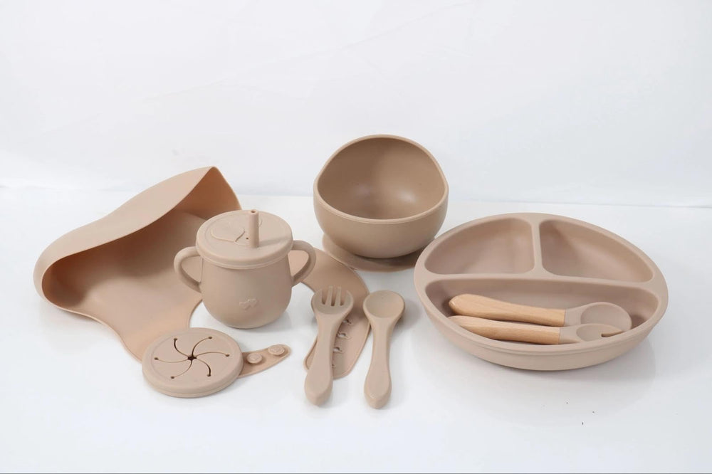 BPA-free silicone baby feeding set with divided plate keeps foods organized during meals.