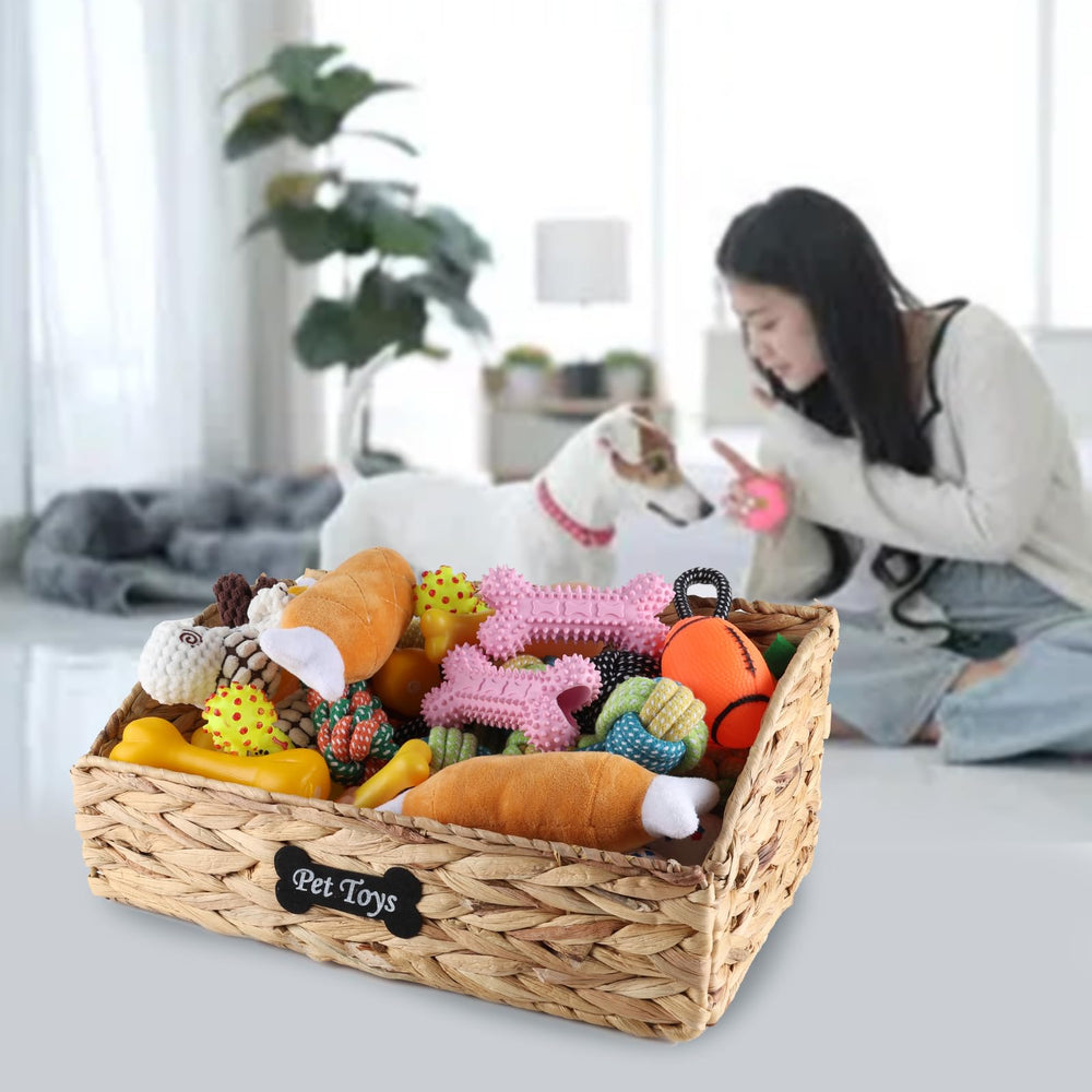 Brabtod basket in living room demonstrates tidy toy organization.