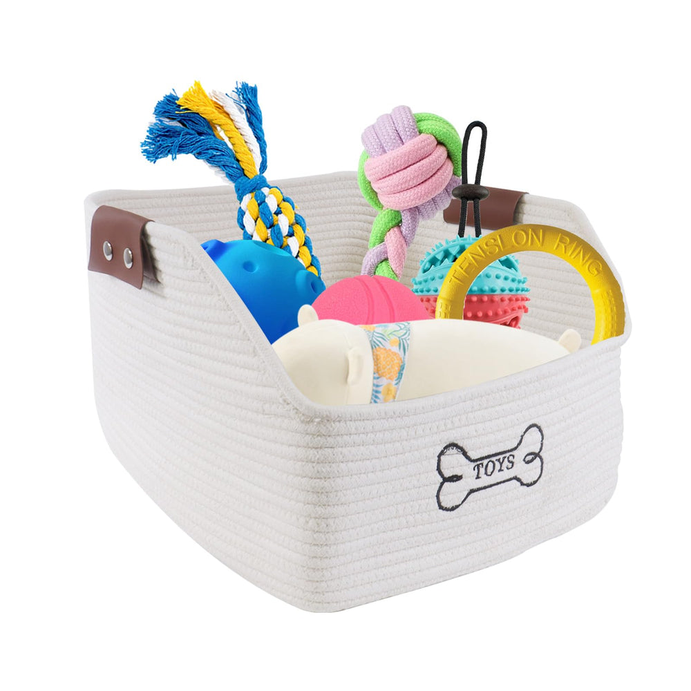 Brabtod dog toy basket with leather handles and spacious interior for toys.