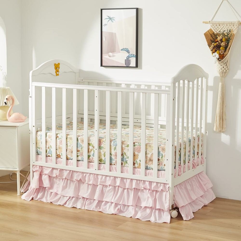 Brandream bed skirt shows four-sided drop for full crib coverage.