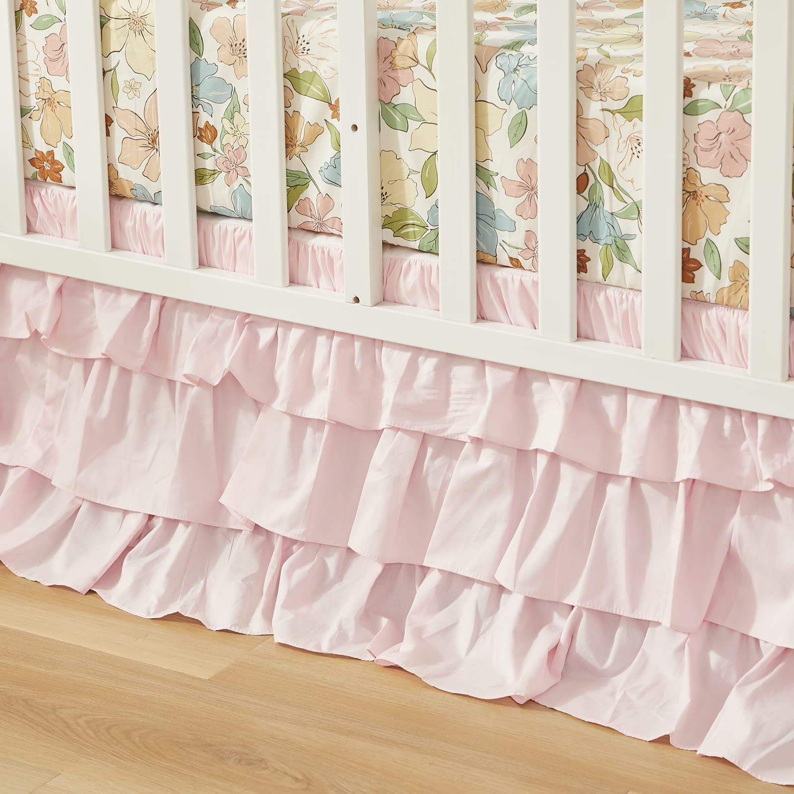 Brandream bed skirt with ruffles provides four-sided coverage for cribs.