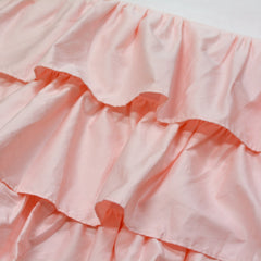 Brandream blush pink triple-layer crib skirt adds depth and cozy feel to nursery.