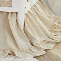 Brandream boho crib skirt in beige dust ruffle adds subtle texture to a gender-neutral nursery.