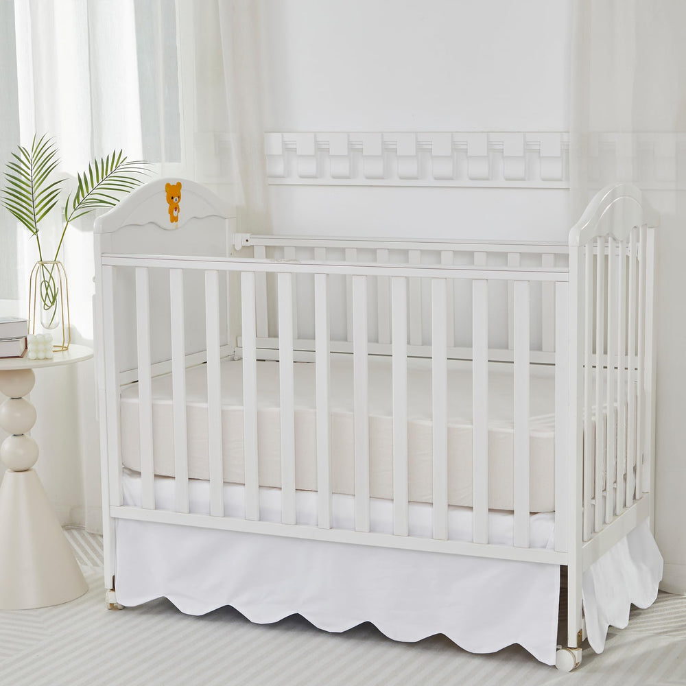 Brandream boho farmhouse nursery styling with this crib skirt.