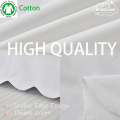 Brandream cream off-white crib skirt detail complements neutral nurseries.