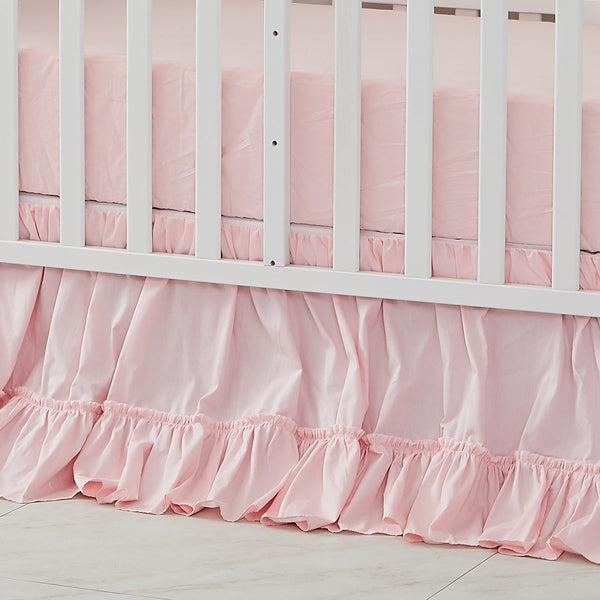 Brandream crib bed skirt in blush pink adds soft nursery color