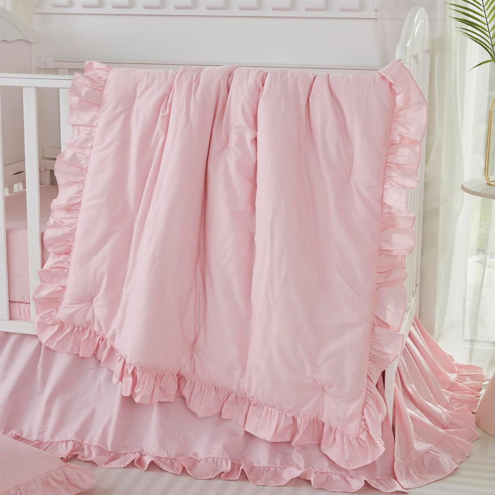 Brandream Farmhouse comforter detail with soft pink ruffles for cozy nursery nights.