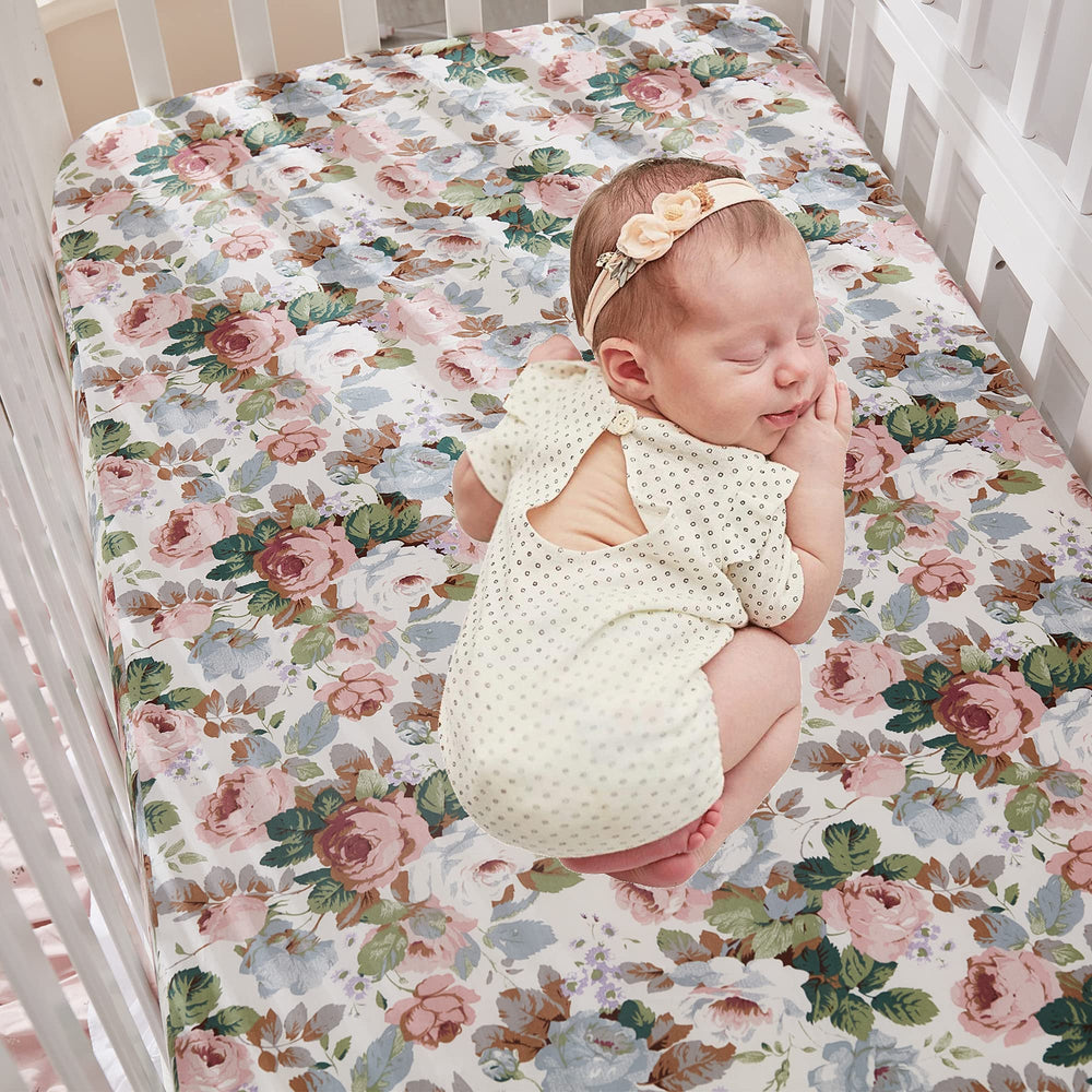 Brandream crib sheet features a watercolor rose print for a charming nursery look.